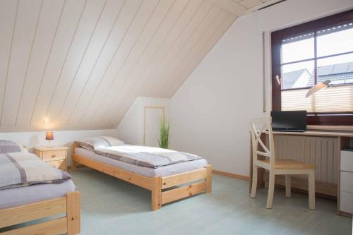 Katil atau katil-katil dalam bilik di Ferienwohnung Winterberg-Blick