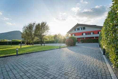 a cobblestone street in front of a building at lepini suites affittacamere in Patrica