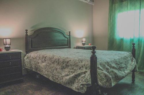 Un pat sau paturi într-o cameră la Casa Valido