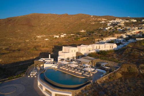 an aerial view of a resort with a swimming pool at Danae Suites Santorini in Oia