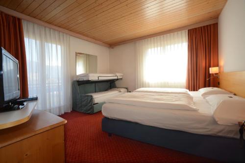 Säng eller sängar i ett rum på Hotel Los Andes