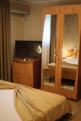 Postel nebo postele na pokoji v ubytování Hotel Casa Italia