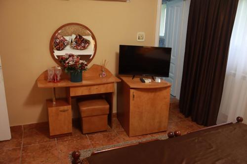 TV a/nebo společenská místnost v ubytování Hotel Casa Italia