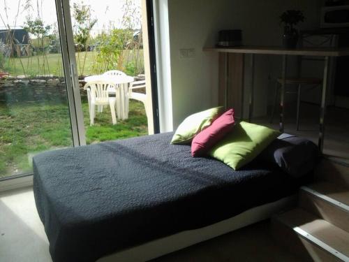 Posteľ alebo postele v izbe v ubytovaní Appartement avec Jardin