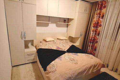 Katil atau katil-katil dalam bilik di Apartament Violeta
