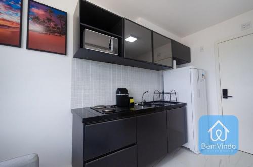 Kuchyň nebo kuchyňský kout v ubytování Studio aconchegante a 150m da Praia de Piatã