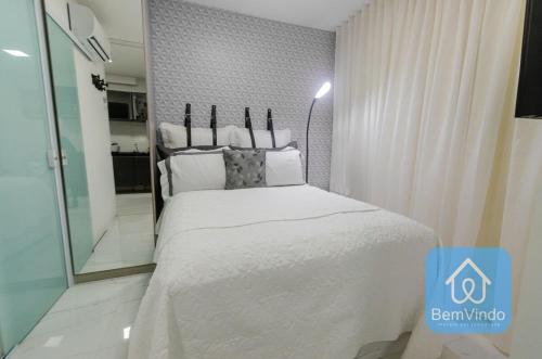 Postel nebo postele na pokoji v ubytování Studio aconchegante a 150m da Praia de Piatã