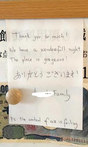 a piece of paper with handwriting on it at Hostel Belle Via Tokyo in Tokyo