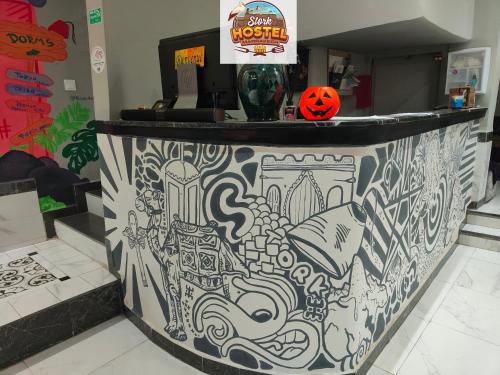 a counter in a store with a pumpkin on it at Stork Marrakech Luxury Hostel in Marrakesh