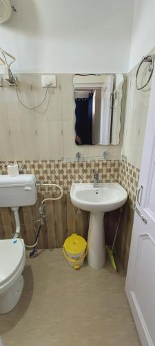 Ein Badezimmer in der Unterkunft Himalayan Homestay