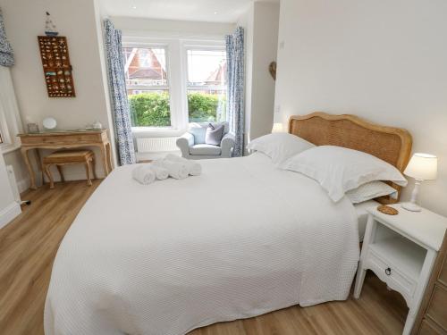 Cama ou camas em um quarto em Seaglimpse