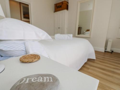 Cama ou camas em um quarto em Seaglimpse