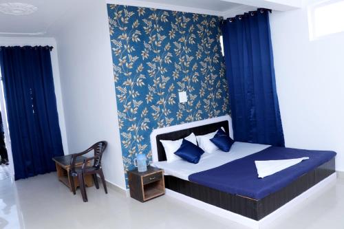 Ein Bett oder Betten in einem Zimmer der Unterkunft Himalayan Homestay