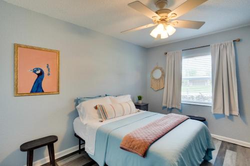 a bedroom with a bed and a ceiling fan at Spacious Wellington Vacation Rental - Private Pool in Wellington