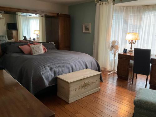 Postel nebo postele na pokoji v ubytování B&B Aux Deux Pignons
