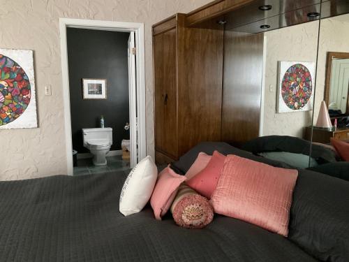 Postel nebo postele na pokoji v ubytování B&B Aux Deux Pignons