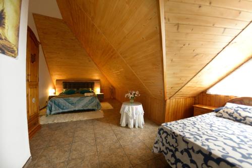 Un pat sau paturi într-o cameră la Villa Meli