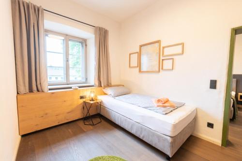 Letto o letti in una camera di LANDHOTEL ALTE ZOLLSTATION- Historical Building