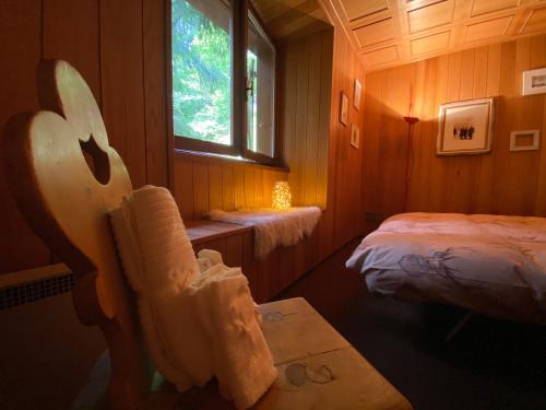 Postel nebo postele na pokoji v ubytování Appartamento sulle piste - Casa Folgarida