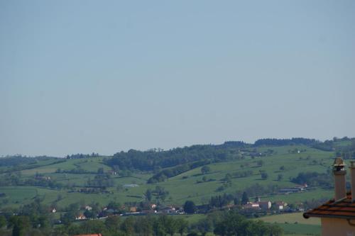 a view of the hills from the castle at Les Cabanes du Grand Nord in Pradines