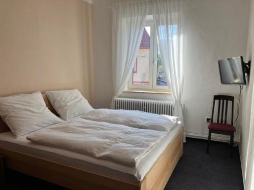 Postel nebo postele na pokoji v ubytování Apartmány Windy