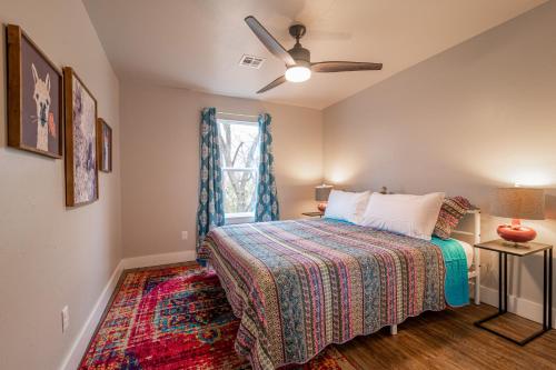 a bedroom with a bed and a window at Plaza Pad II-Near Plaza District in Oklahoma City