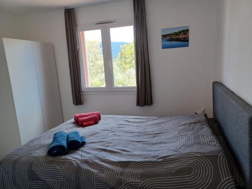 Posteľ alebo postele v izbe v ubytovaní Apt 91, T2 à LECCI avec piscines, proche plage