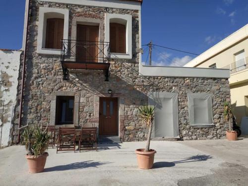 Fotografie z fotogalerie ubytování Seafront two-storey house in Kardamyla v destinaci Mármaron