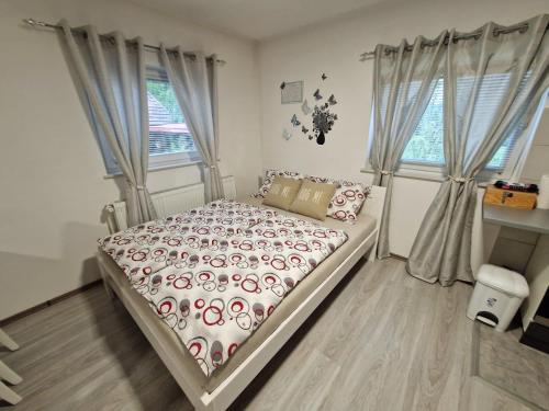 Postel nebo postele na pokoji v ubytování Guesthouse Ella