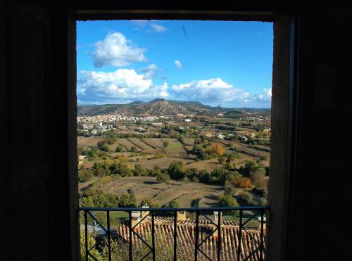 a view of a valley from a window at Casa con terraza con vistas al valle - Cal Taverner in Montsonis