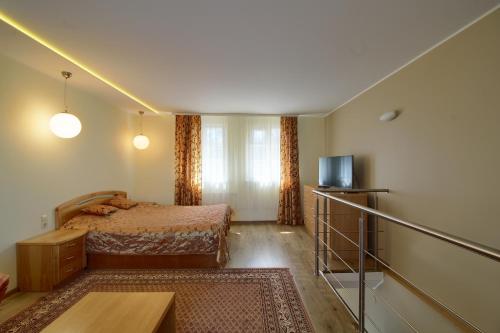 Ліжко або ліжка в номері Pas Edgara