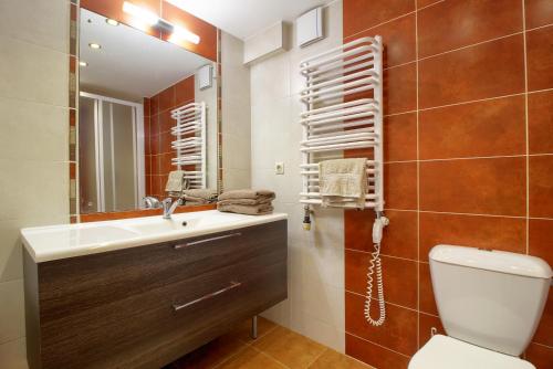 Ванна кімната в Pas Edgara