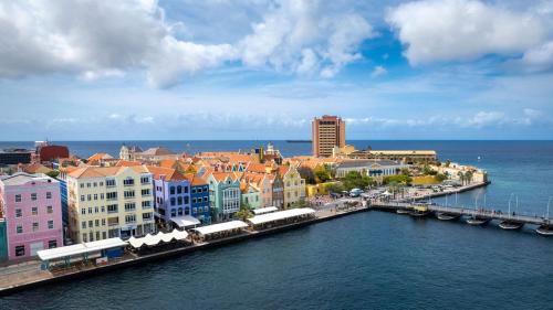 an aerial view of a city with a harbor at Downtown Dreamstay, Classic 2BR Suites in Willemstad