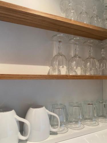 Příslušenství pro přípravu čaje a kávy v ubytování Tiny Guesthouse