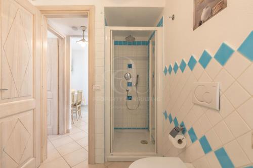 a bathroom with a shower and a toilet in it at IL Castello incantato in Castelsardo