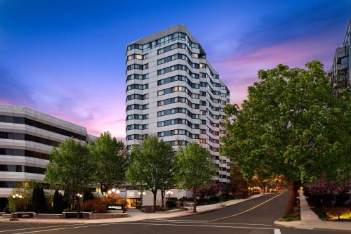 a tall white building on a city street at Residence Inn White Plains Westchester County in White Plains