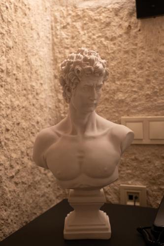 a white bust of a woman sitting on a table at Vigor Cappadocia - Special Class in Uchisar