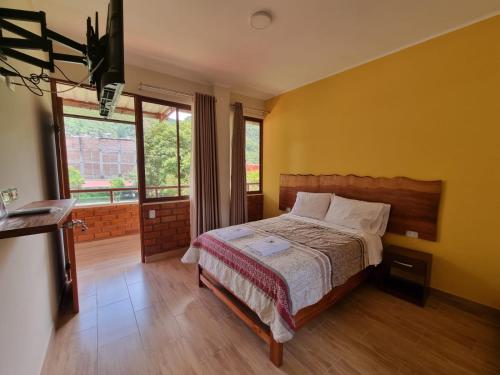 Postel nebo postele na pokoji v ubytování Pampa Bella Lodge