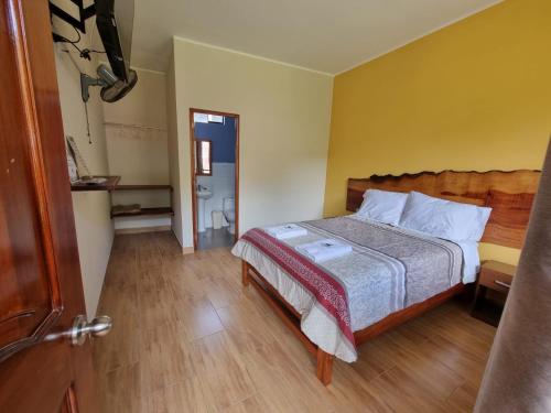 Postel nebo postele na pokoji v ubytování Pampa Bella Lodge