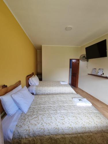 Postel nebo postele na pokoji v ubytování Pampa Bella Lodge