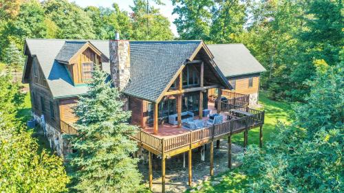 an overhead view of a log home with a deck at Family Sanity in McHenry