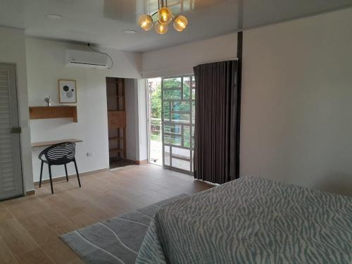 Postel nebo postele na pokoji v ubytování exclusivo apartamento