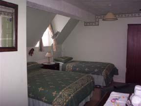 Postel nebo postele na pokoji v ubytování Ye Olde Station Guest House Birmingham, Shustoke
