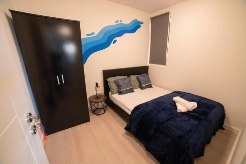 Un ou plusieurs lits dans un hébergement de l'établissement Stunning 1-Bed Apartment in London