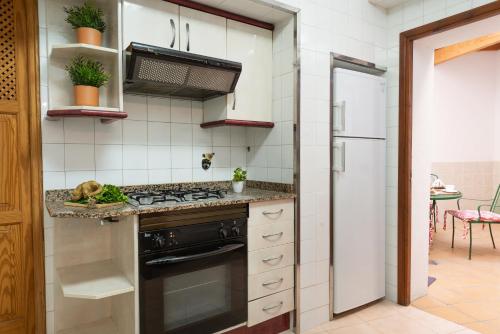 Кухня или мини-кухня в Townhouse Can Bregat
