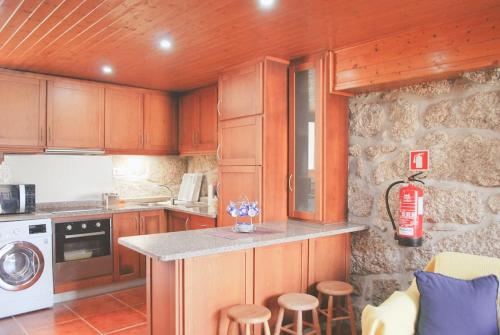 O bucătărie sau chicinetă la Retiro de Várzeas . Casa de Turismo Rural