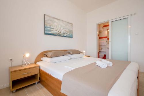 Posteľ alebo postele v izbe v ubytovaní House Šubić