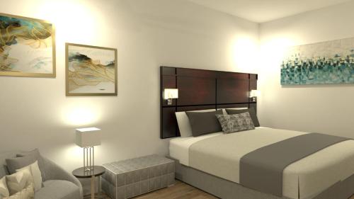 Ein Bett oder Betten in einem Zimmer der Unterkunft Country Place Hotel