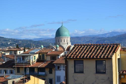 a view of the roofs of a city at Palazzo Graziani in Florence