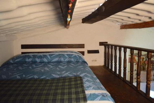 Un pat sau paturi într-o cameră la Finca Cantaclaro